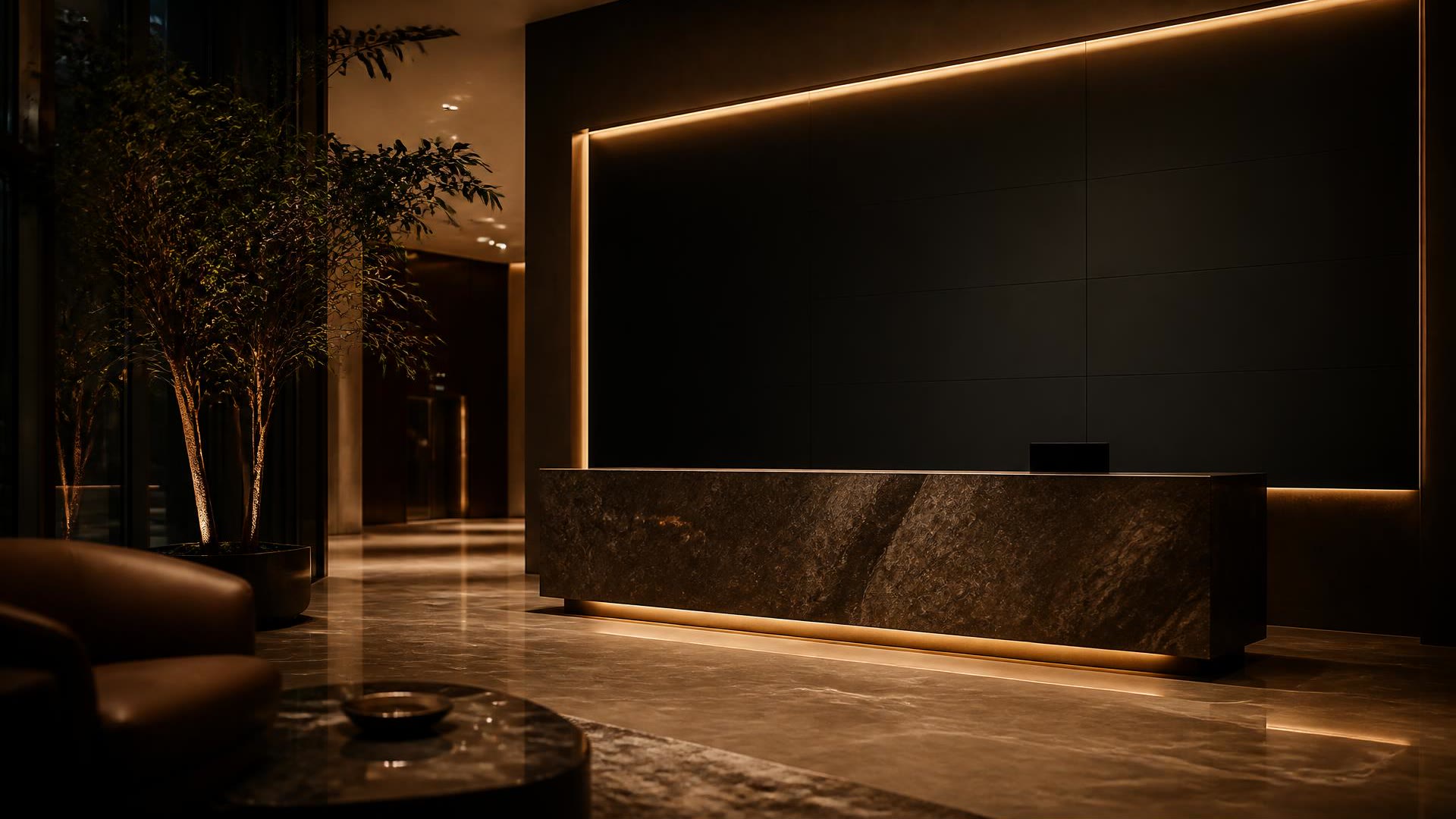 Corporate lobby at night with a display wall